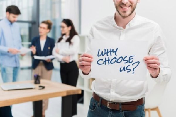 business-man-holding-paper-with-why-choose-us-question_23-2148932312